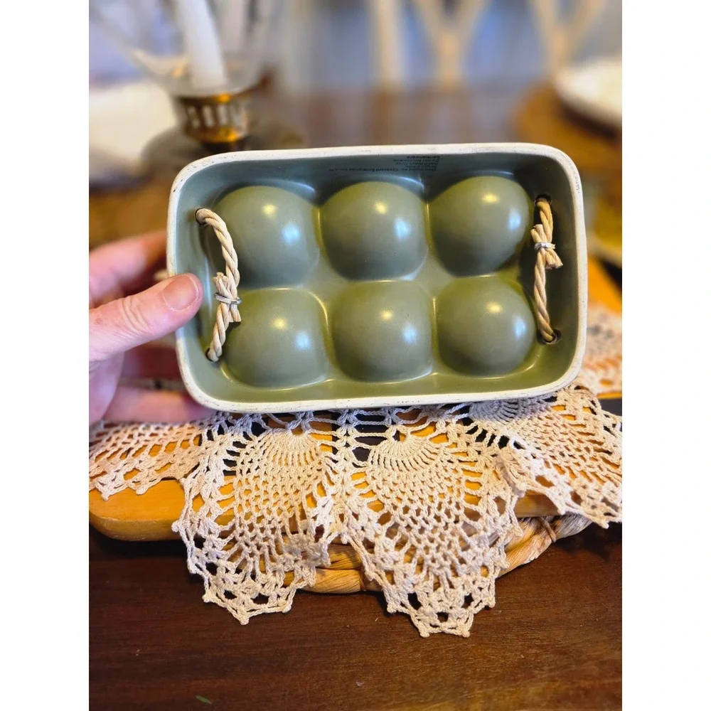 sage green ceramic earthenware egg holder with rope handles